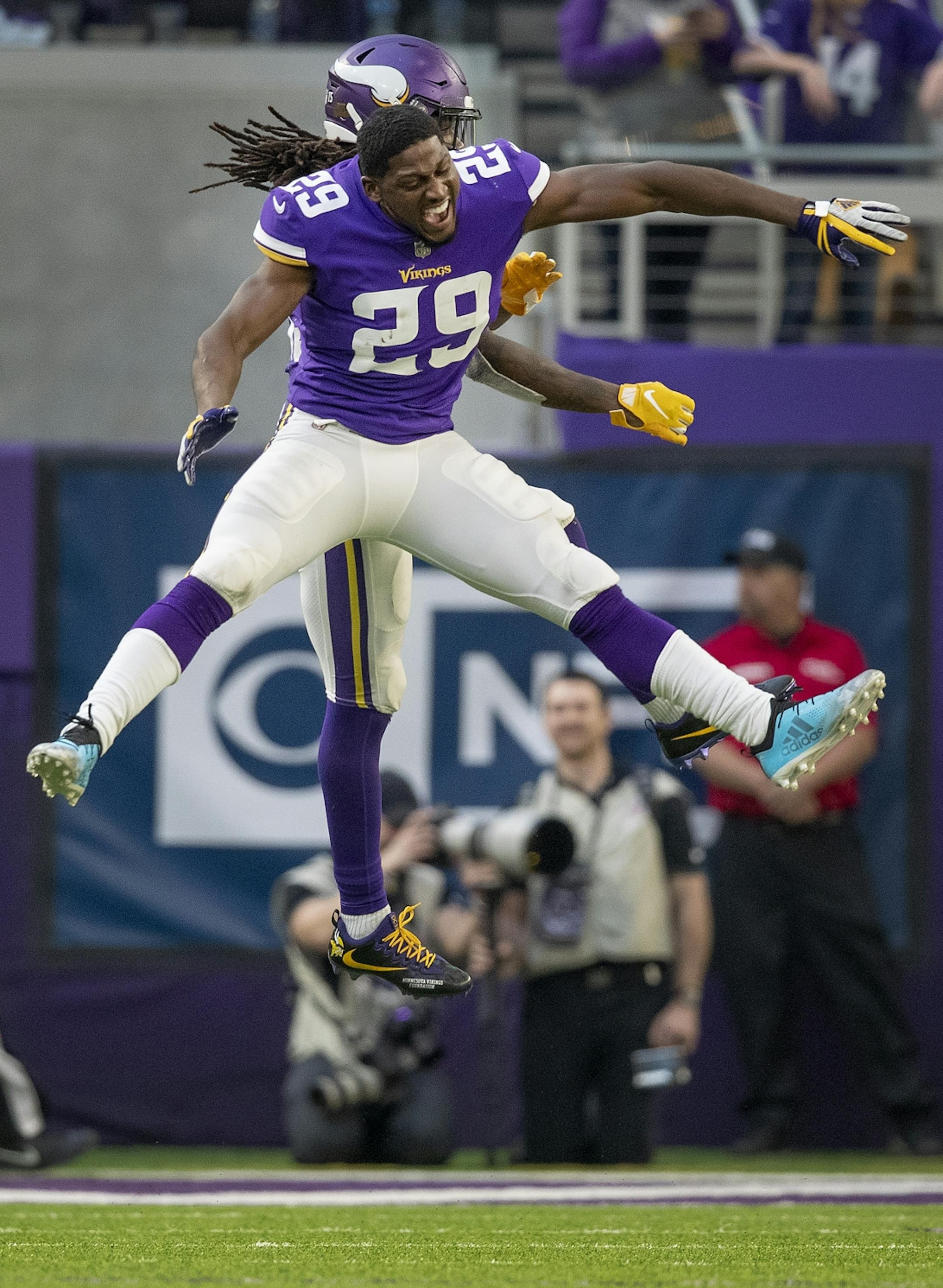 Xavier Rhodes and Dalvin Cook after a Cook 21-yard touchdown run in the fourth quarter.