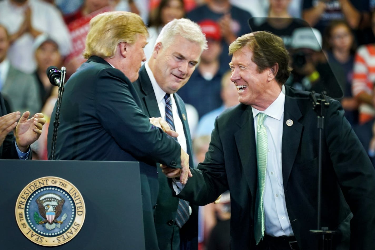 President Donald Trump welcomed Minnesota congressmen Tom Emmer and Jason Lewis to the podium.