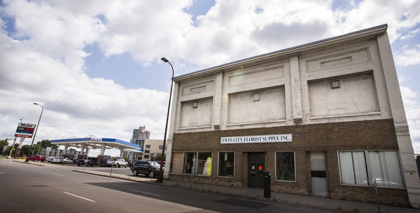 The building that the owners of Bobby and Steve's Auto World own and would like to demolish, located next to their service station in downtown Minneapolis on Friday, August 7, 2015. ] LEILA NAVIDI leila.navidi@startribune.com / BACKGROUND INFORMATION: The most prominent gas station near downtown Minneapolis wants to make it easier for cars to drive in and out of their property, but a 123-year-old relic of Minneapolis' Swedish cultural history is standing in the way. City staff has recommended de