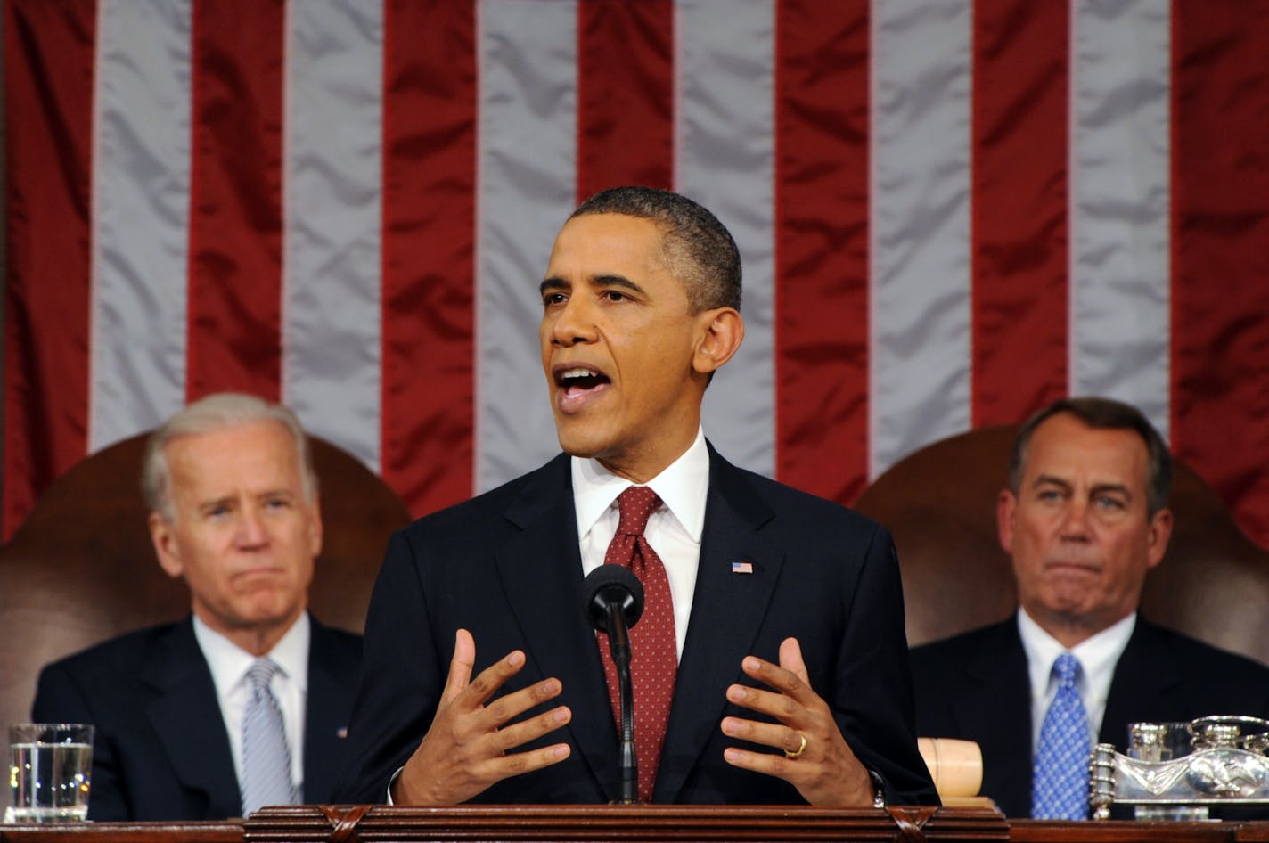 President Barack Obama delivers his State of the Union address on Capitol Hill in Washington, Tuesday, Jan. 24, 2012. Listen in back are Vice President Joe Biden and House Speaker John Boehner, right.