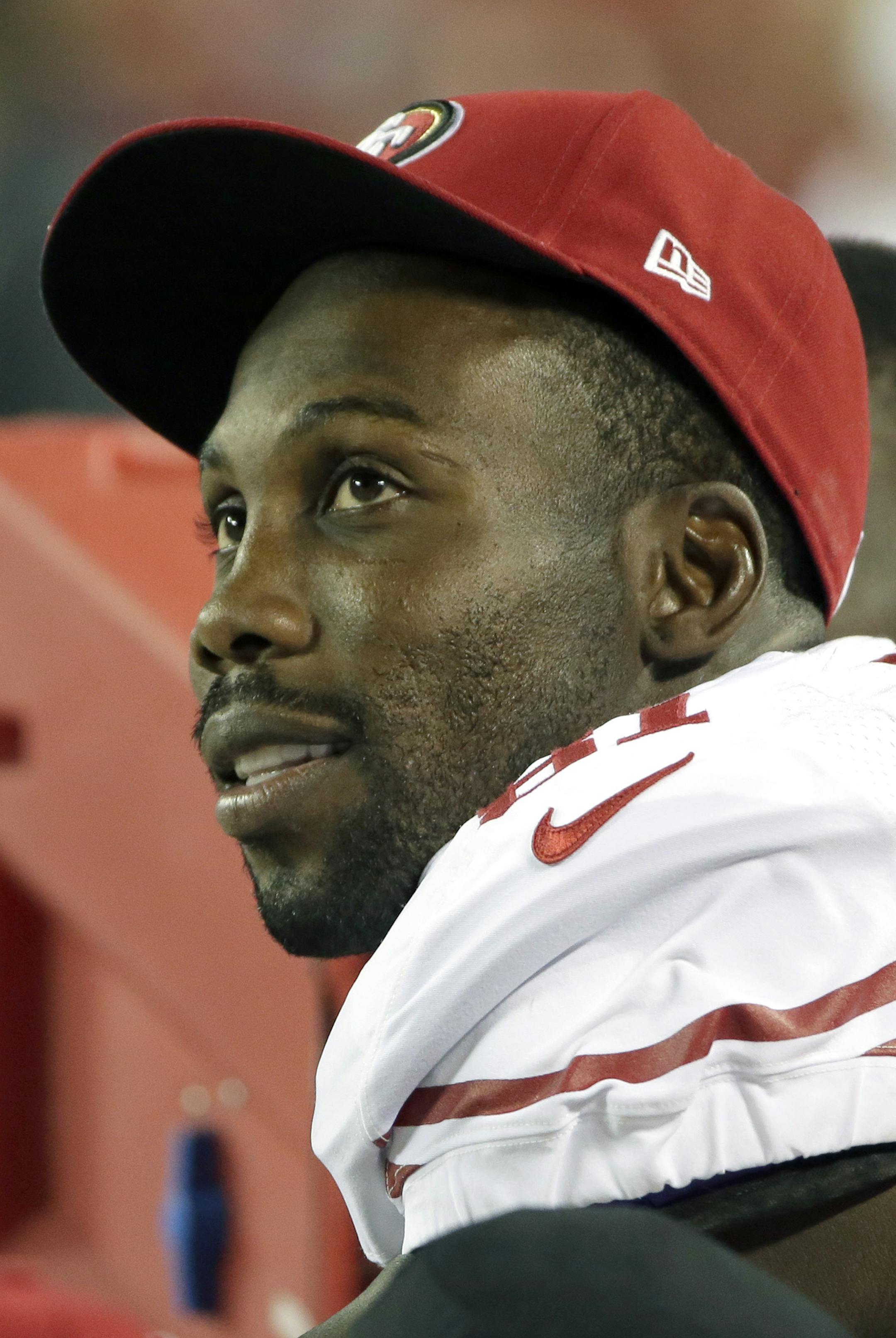 San Francisco 49ers wide receiver Anquan Boldin (81) watches during the second half of a preseason NFL football game Friday, Aug. 16, 2013, in Kansas City, Mo. San Francisco won the game 15-13. (AP Photo/Charlie Riedel) ORG XMIT: MIN2013082321272574