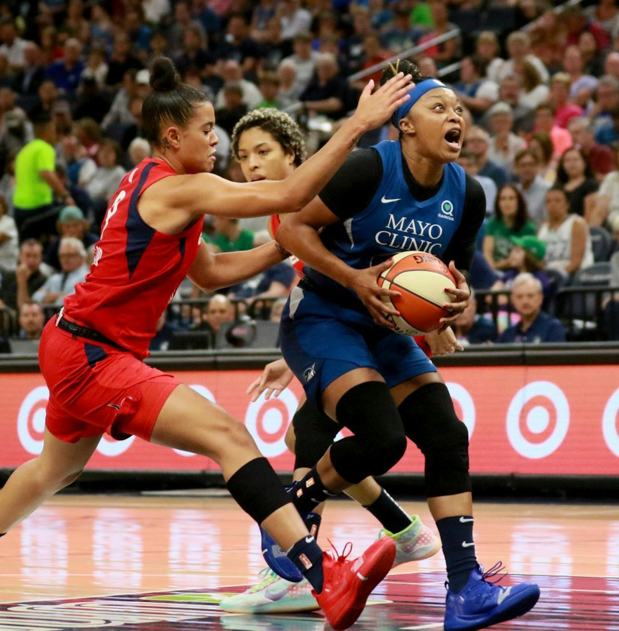 The Minnesota Lynx's Odyssey Sims (1) has the ball stripped by the Washington Mystics' Natasha Cloud (9) during the first half of the Lynx game Friday, Aug. 16, 2019, at the Target Center in Minneapolis, MN.