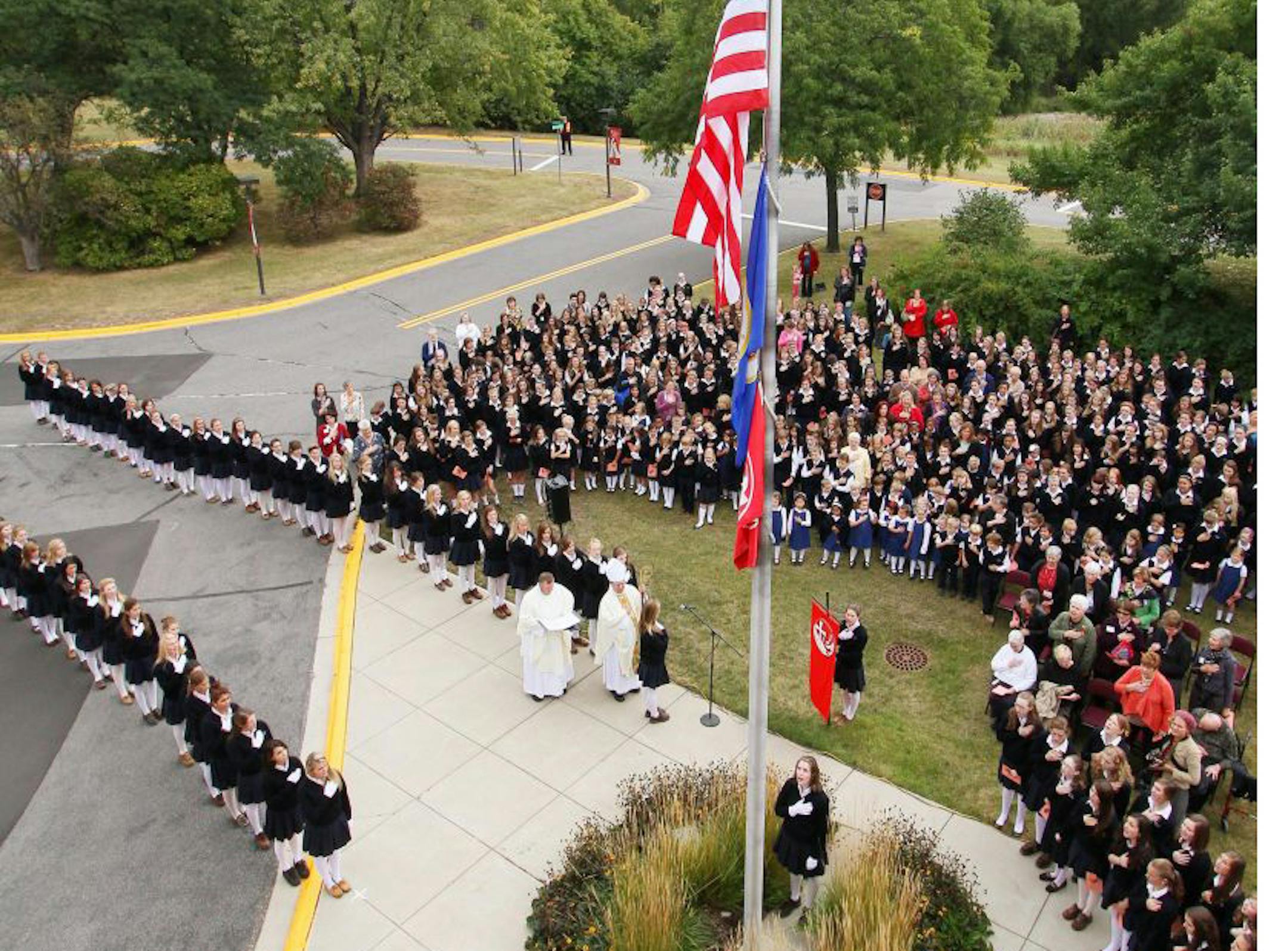 File photo of all-school Mass and flag raising at Convent of the Visitation School.