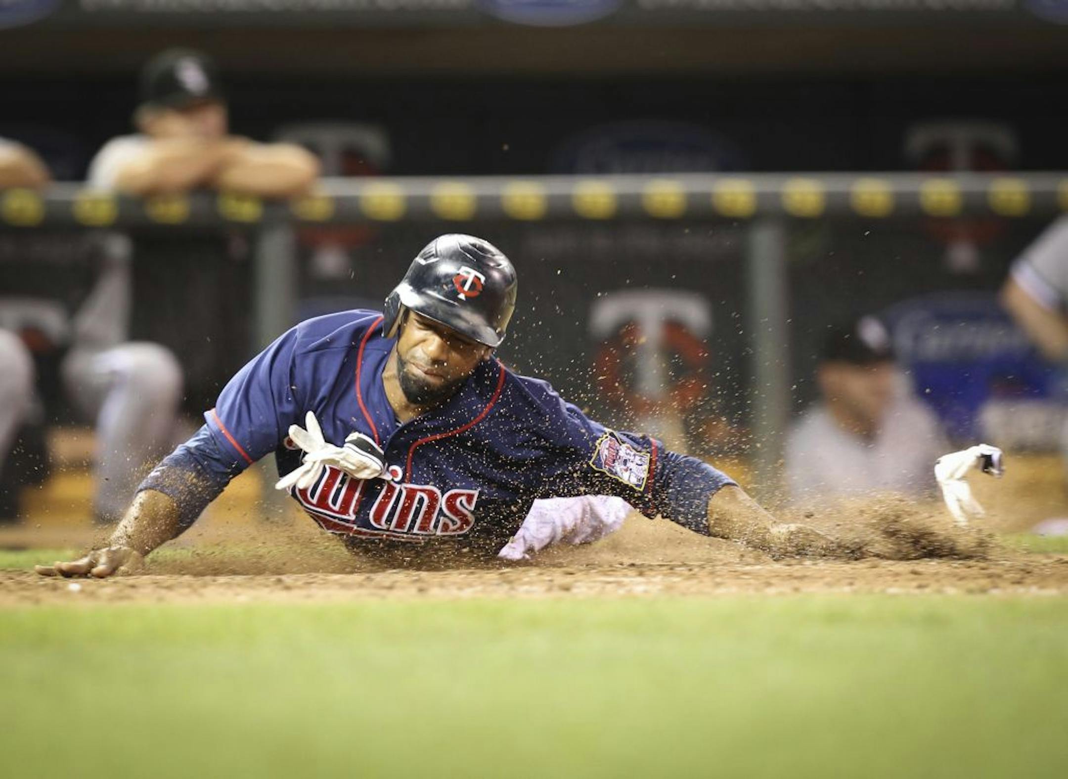 Alexi Casilla scored on Jamey Carroll's sacrifice fly Monday for the Twins' fourth walk-off victory this season.