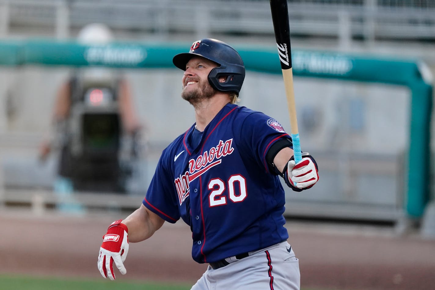 Minnesota Twins' Josh Donaldson watches his two-run home run during the second inning of the team's spring training baseball game against the Boston Red Sox Thursday, March 25, 2021, in Fort Myers, Fla. (AP Photo/John Bazemore)