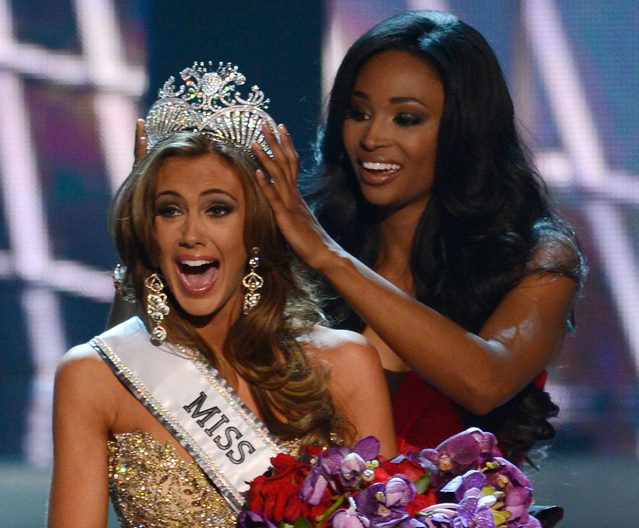 Miss Connecticut Erin Brady is crowned the winner of the Miss USA 2013 pageant by Nana Meriwether, Sunday, June 16, 2013, in Las Vegas. (AP Photo/Jeff Bottari)