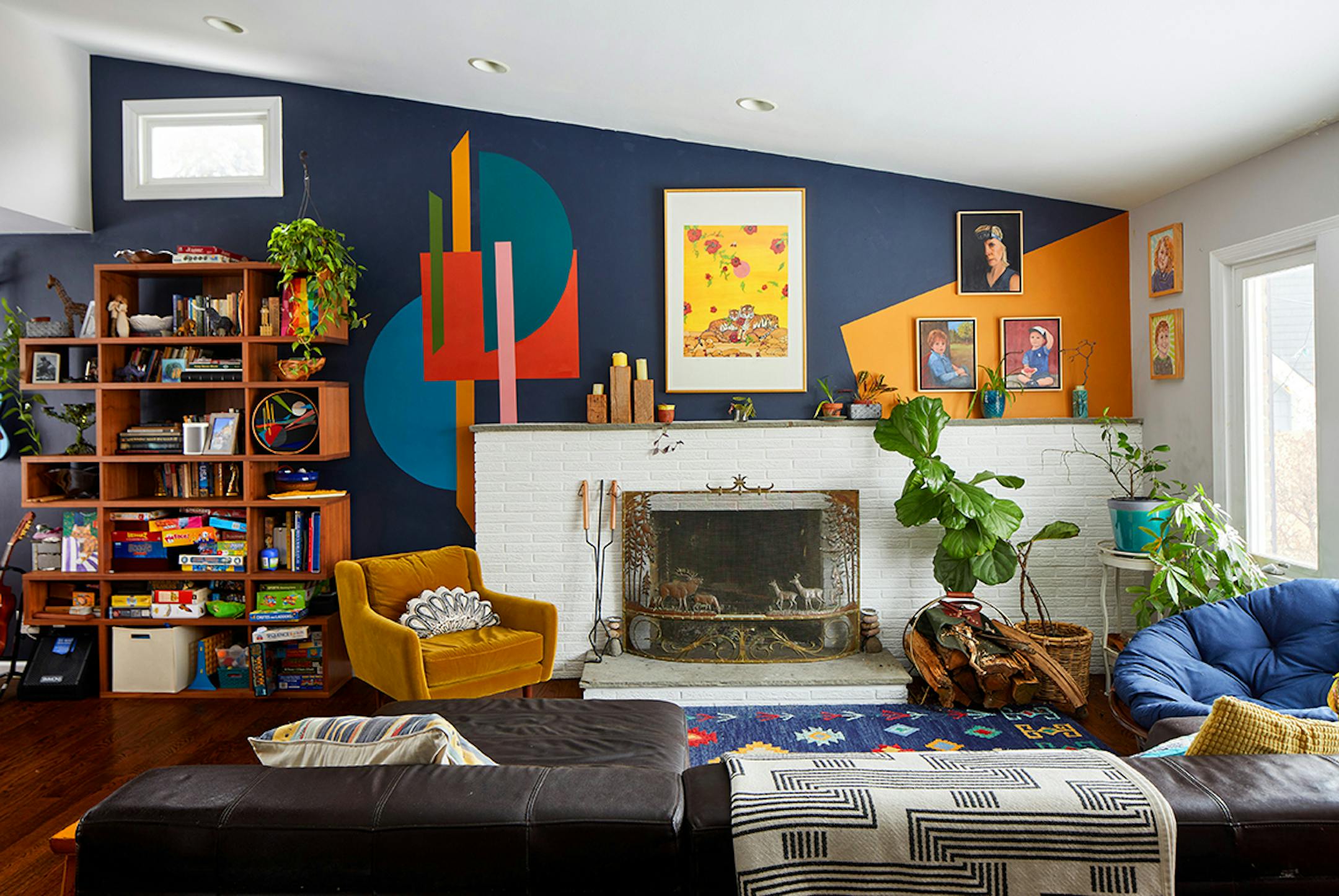 The colorful mural that Jen Rondeau painted on a living room wall at her home in West Orange, N.J., Feb. 12, 2021. Since they have spent so much time at home in the last year, some homeowners have taken craft and design projects to a new level. (Laura Moss/The New York Times)