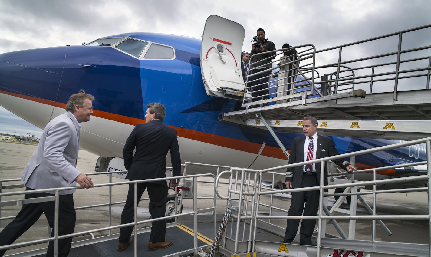 Marty Davis, Chairman and owner, and brother Mitch tour with pilot Brian Roseen on one of the new 737's in Sun Country's fleet.]At one of Sun Country's hangar's at MSP, Sun Country Airlines and its pilots, represented by Air Line Pilots Association in negotiations, officially signed their new contract Thursday after a long negotiation process.Richard Tsong-Taatarii/rtsong-taatarii@startribune.com