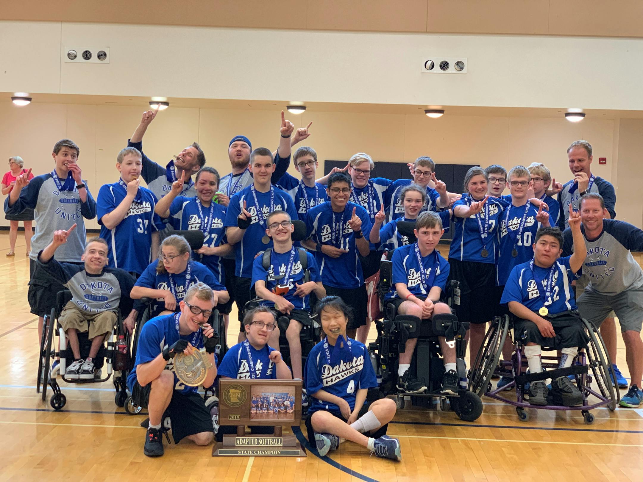 Dakota United physically impaired team, state champions in adapted softball, runner-up in adapted soccer. Photo taken after the softball championship onJune 1. Photo by Karla Sonnenberg, Apple Valley.