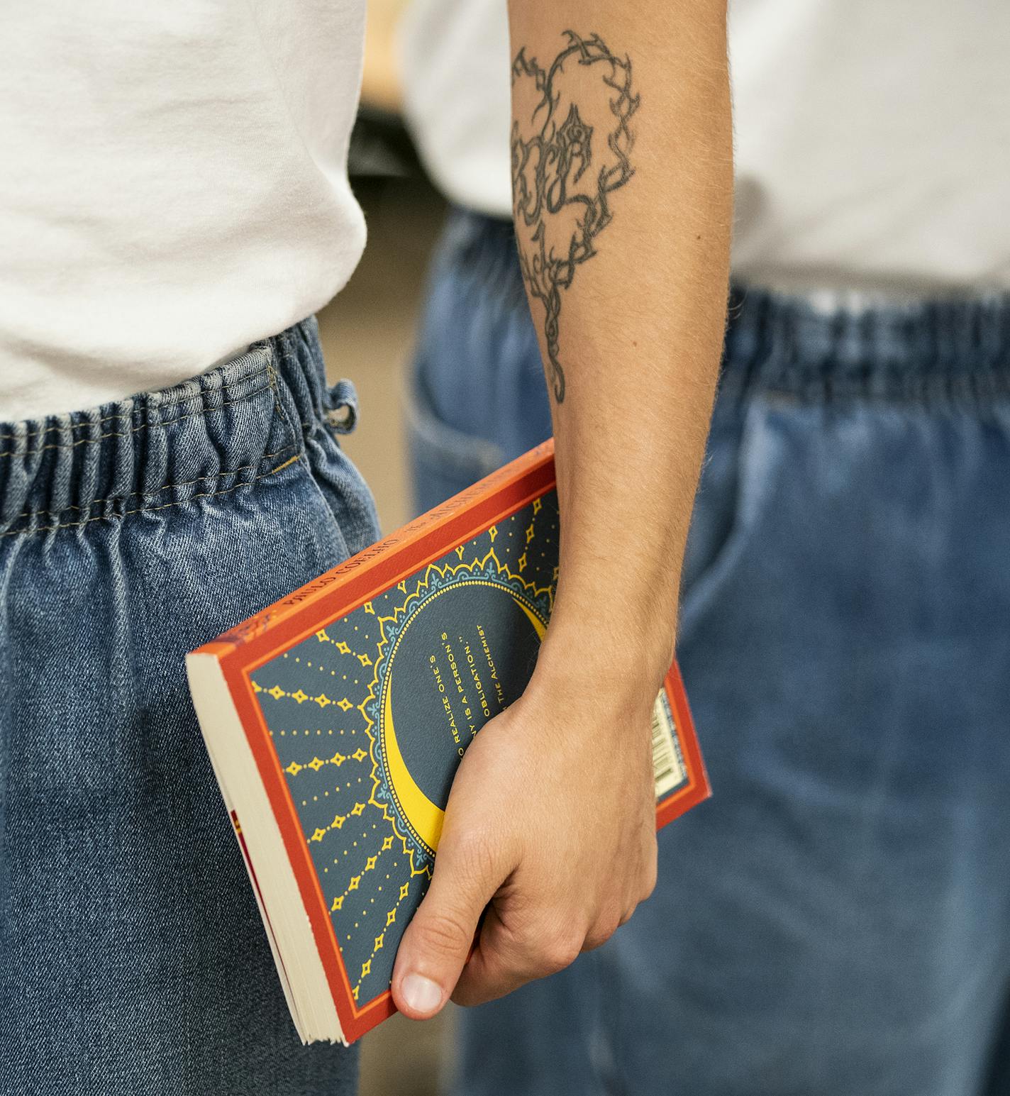 Shawn Benson, one of nine inmates who participated in the book club, carried its first selection, "The Alchemist' by Paulo Coelho.