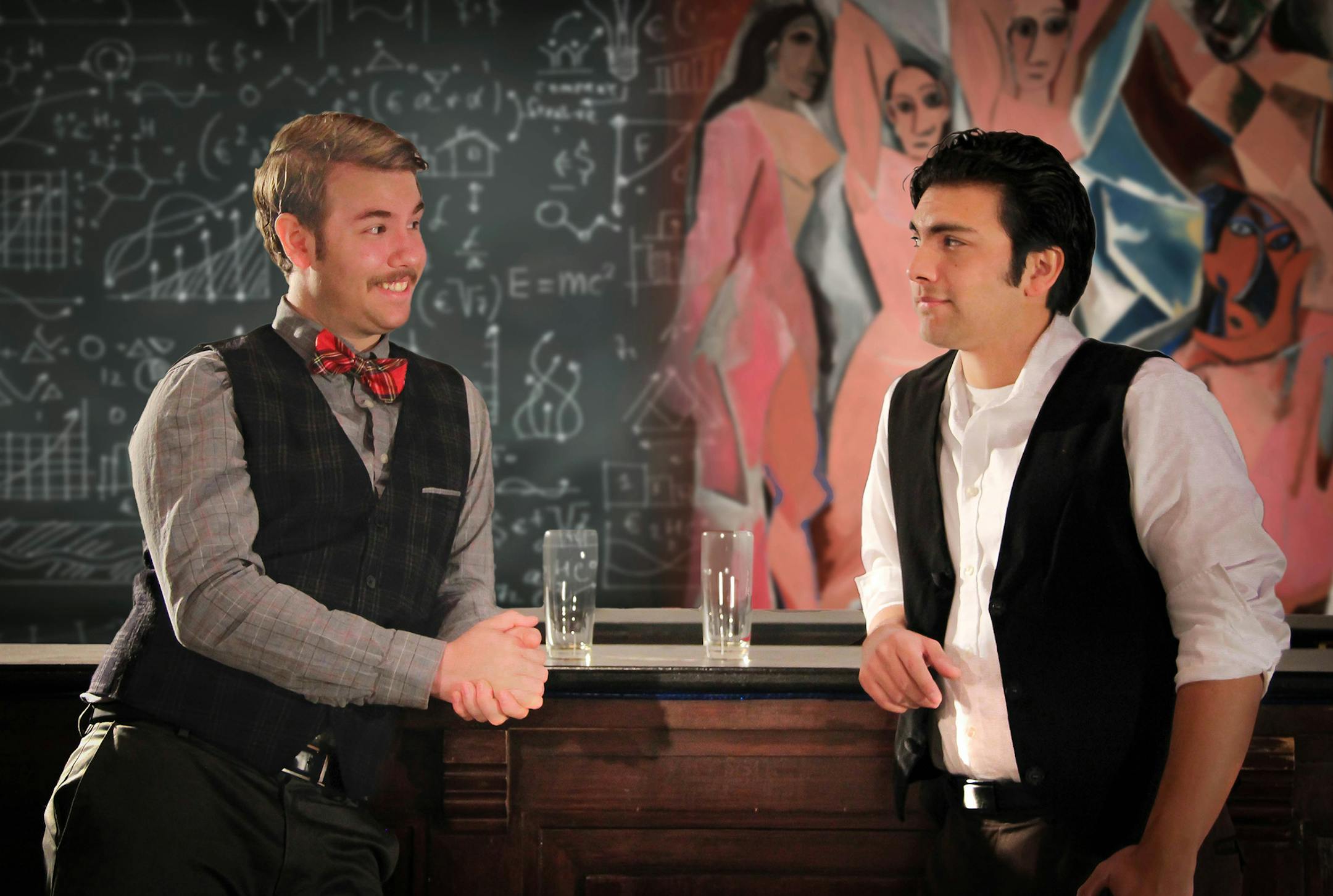 A.J. Swanson as Albert Einstein and Justin David Cervantes as Pablo Picasso in "Picasso at the Lapin Agile" by Steve Martin, produced by the Chameleon Theatre Circle at the Gremlin Theatre.
credit: Daniel K. McDermott