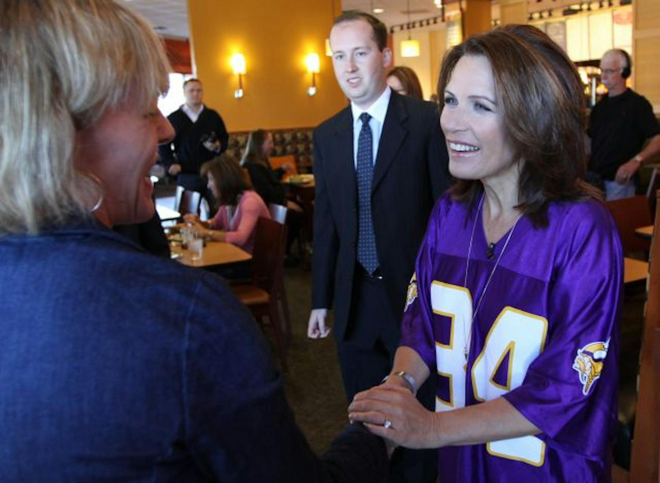 Rep. Michele Bachmann greeted Jennifer Bena at a Woodbury restaurant while campaigning Wednesday.