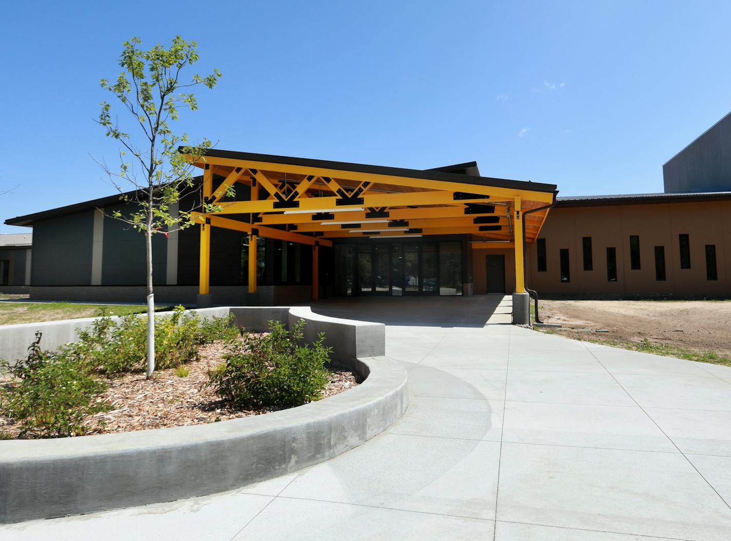 Monday, July 30, 2018 was dedication day for the new Bug-O-Nay-Ge- Shig School in Bena, Minnesota. Here, an exterior of the new school.]
DAVID JOLES &#xef; david.joles@startribune.com Four years ago, the aging and dilapidated converted garage that served as the high school for the Leech Lake Band of Ojibwe was one of 62 Bureau of Indian Educations facilities nationwide in dire need of repair. The roof leaded. The ceilings were filled with mold and the walls with rodents and bats. In high winds,