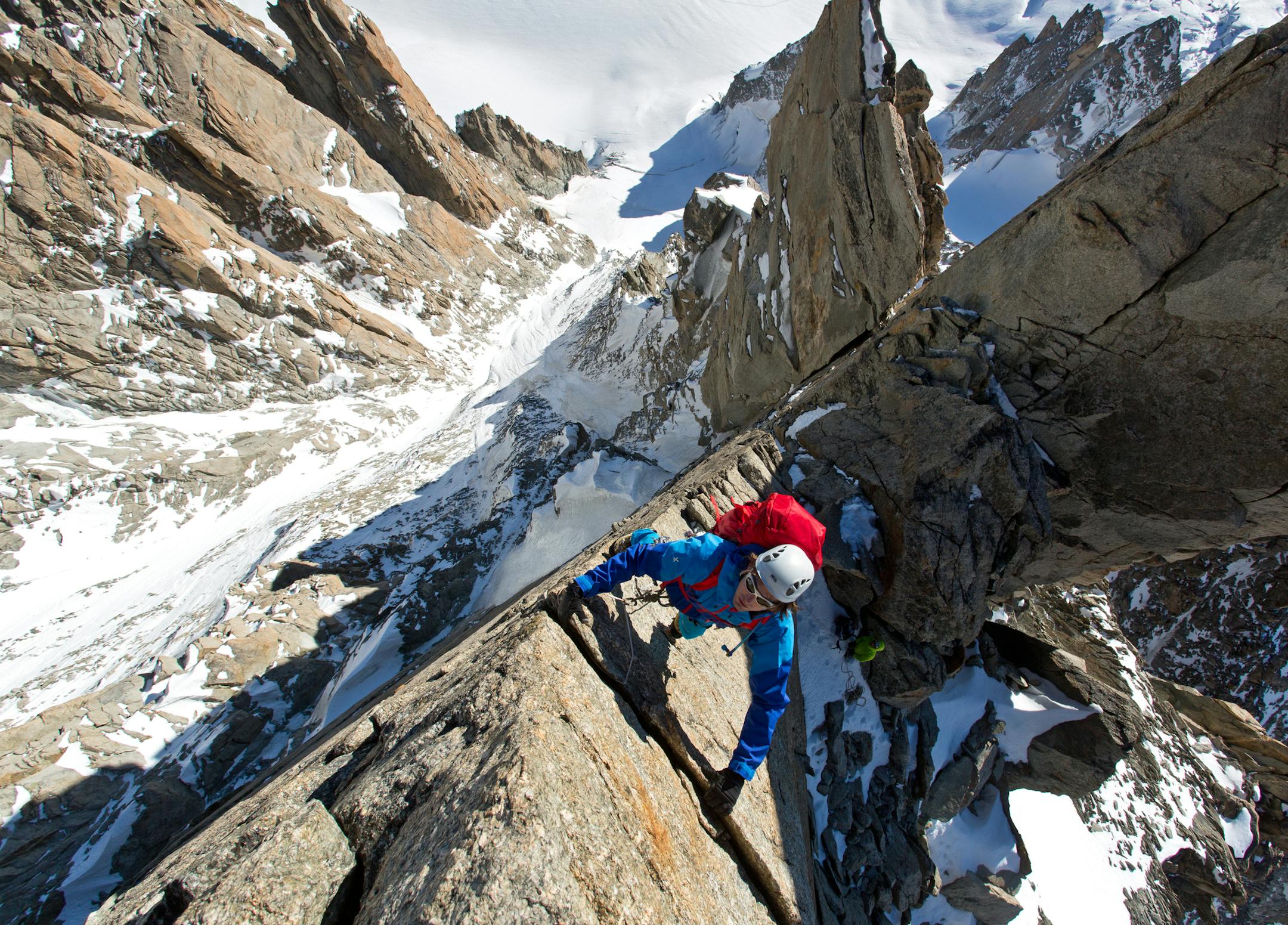 Ben Briggs on the first exposed gendarme on the Diables arete, in "Mountain."