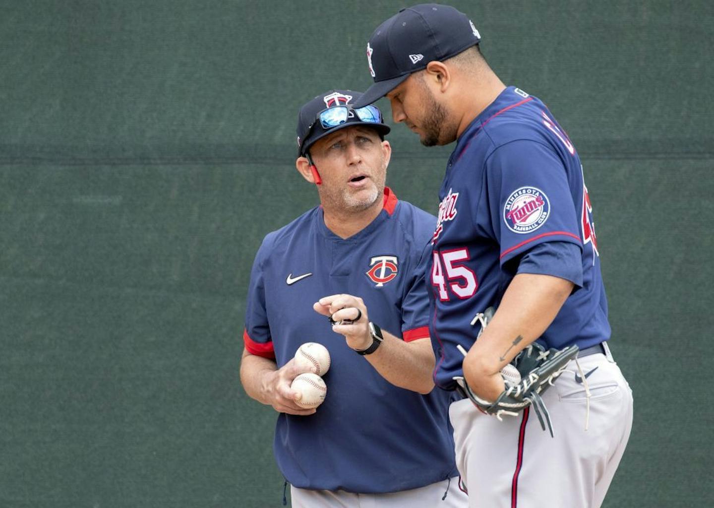 Wes Johnson spoke with pitcher Jhoulys Chacin (45) last month.