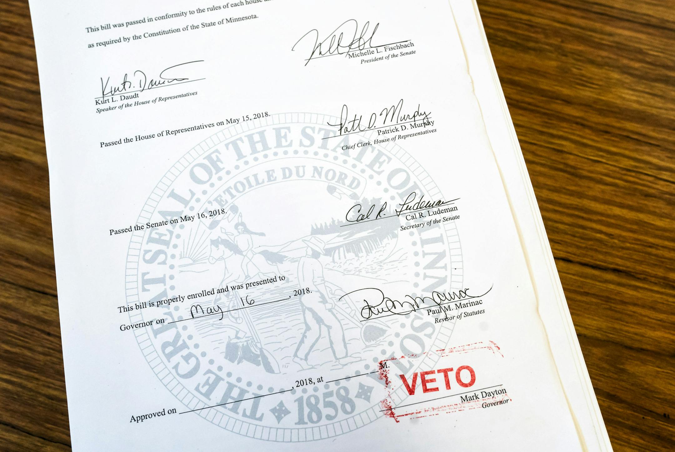 Gov. Mark Dayton vetoed the Republican tax bill at Bruce Vento Elementary in St. Paul and called attention to his own bid to pressure Republicans to approving emergency state aid for schools. ] GLEN STUBBE &#xef; glen.stubbe@startribune.com Thursday, May 17, 2018 Gov. Mark Dayton will veto the Republican tax bill Thursday morning, leaving he and legislators four days to revive a legislative session that seems to have stalled with few major accomplishments.