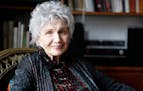 FILE - Canadian author Alice Munro is photographed during an interview in Victoria, B.C., Dec.10, 2013.