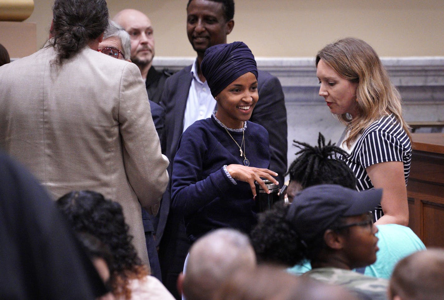 U.S. Rep. Ilhan Omar, center, had been scheduled to arrive in Israel this weekend and was to visit the Israeli-occupied West Bank.