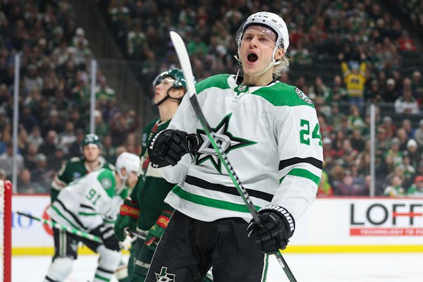 Stars center Roope Hintz (24) celebrated after scoring a shorthanded goal against the Wild during the first period Monday in St. Paul.
