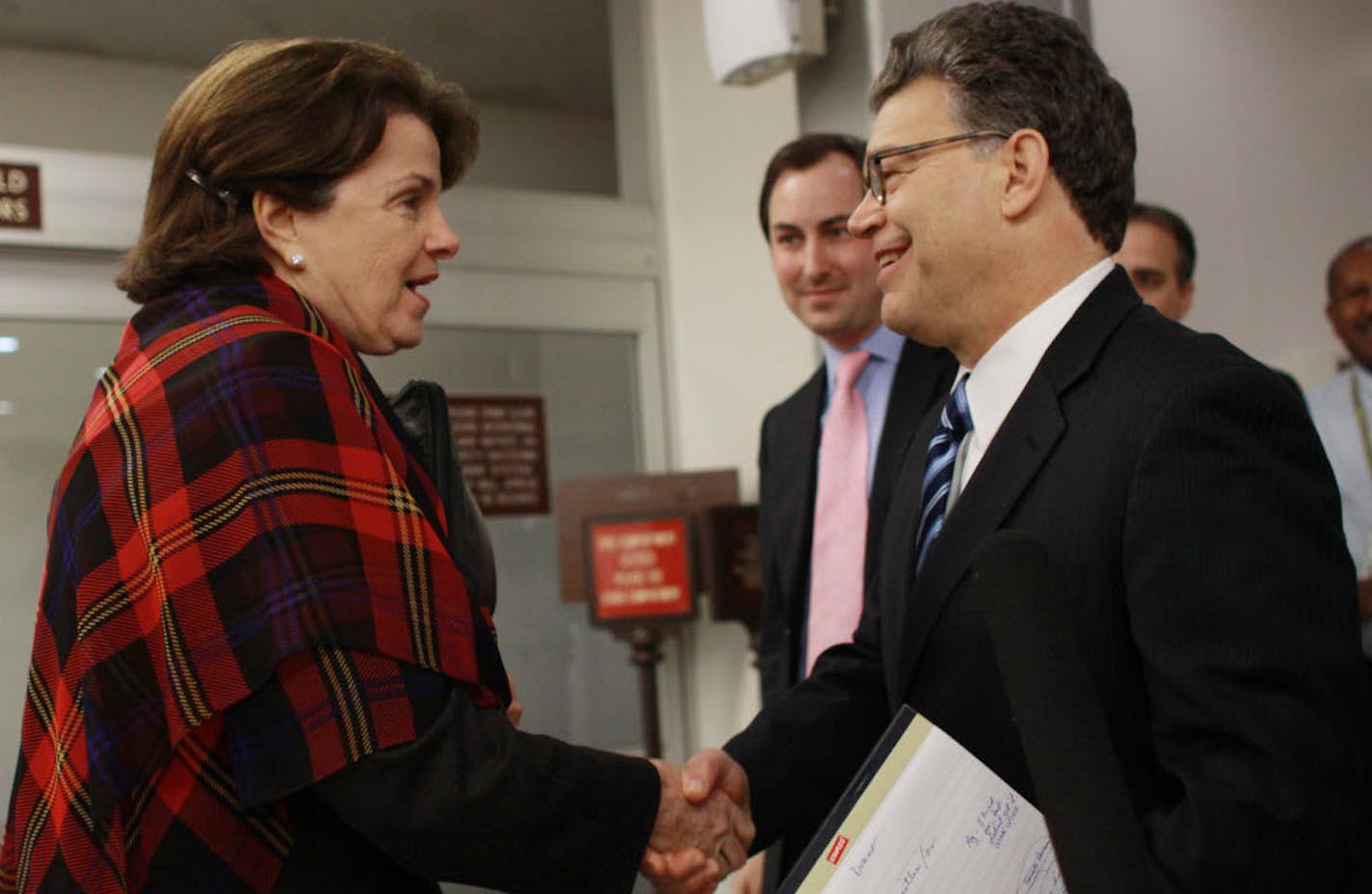 Al Franken greets Sen. Dianne Feinstein, D-Calif. on Capitol Hill in Washington on Wednesday following a meeting with Senate Majority Leader Harry Reid of Nevada.