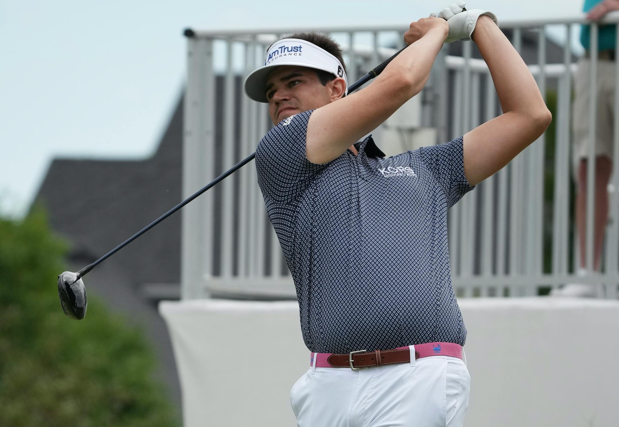 Beau Hossler tees off on the 18th hole of the 3M Open at Tournament Players Club Twin Cities in Blaine on Sunday. He shot a final round of 9-under-par 62, tying the course record.