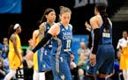 Minnesota Lynx guard Lindsay Whalen (13) and other teammates weren't overly jubilant after an ugly 74-71 finish against the Indiana Fever.