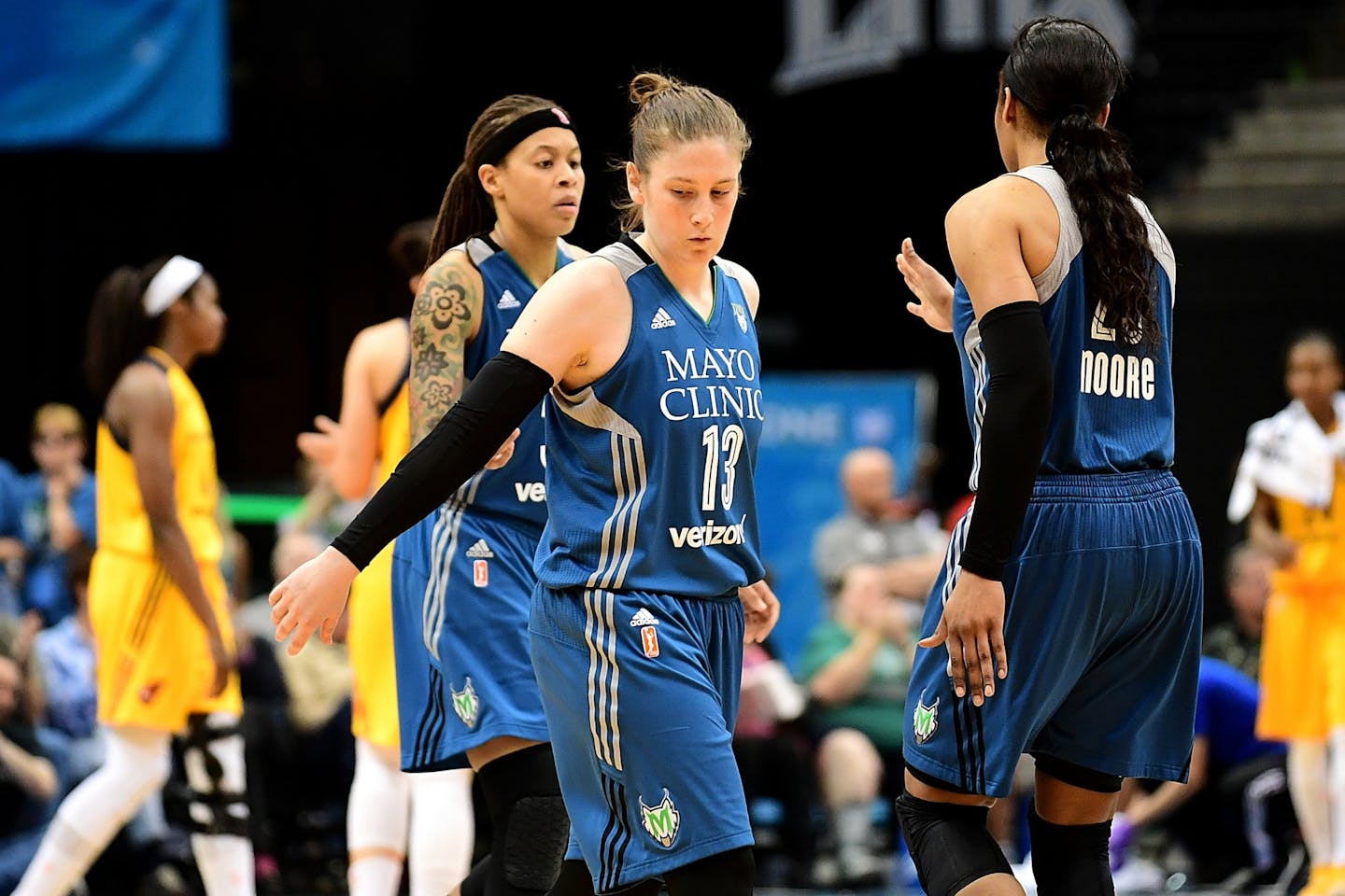 Minnesota Lynx guard Lindsay Whalen (13) and other teammates weren't overly jubilant after an ugly 74-71 finish against the Indiana Fever.