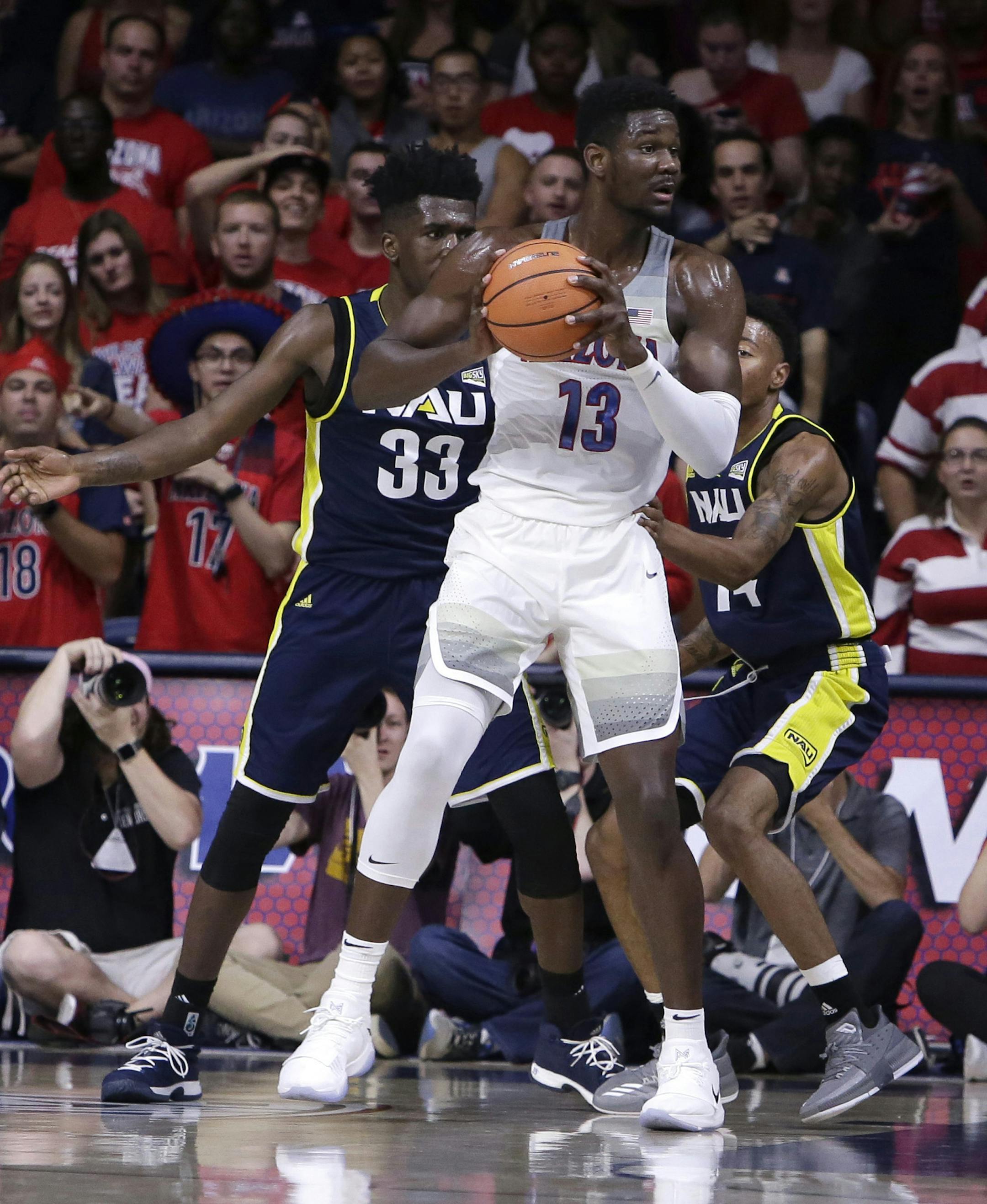 Arizona forward Deandre Ayton (13) in the first half during an NCAA college basketball game against Northern Arizona, Friday, Nov. 10, 2017, in Tucson, Ariz. (AP Photo/Rick Scuteri)