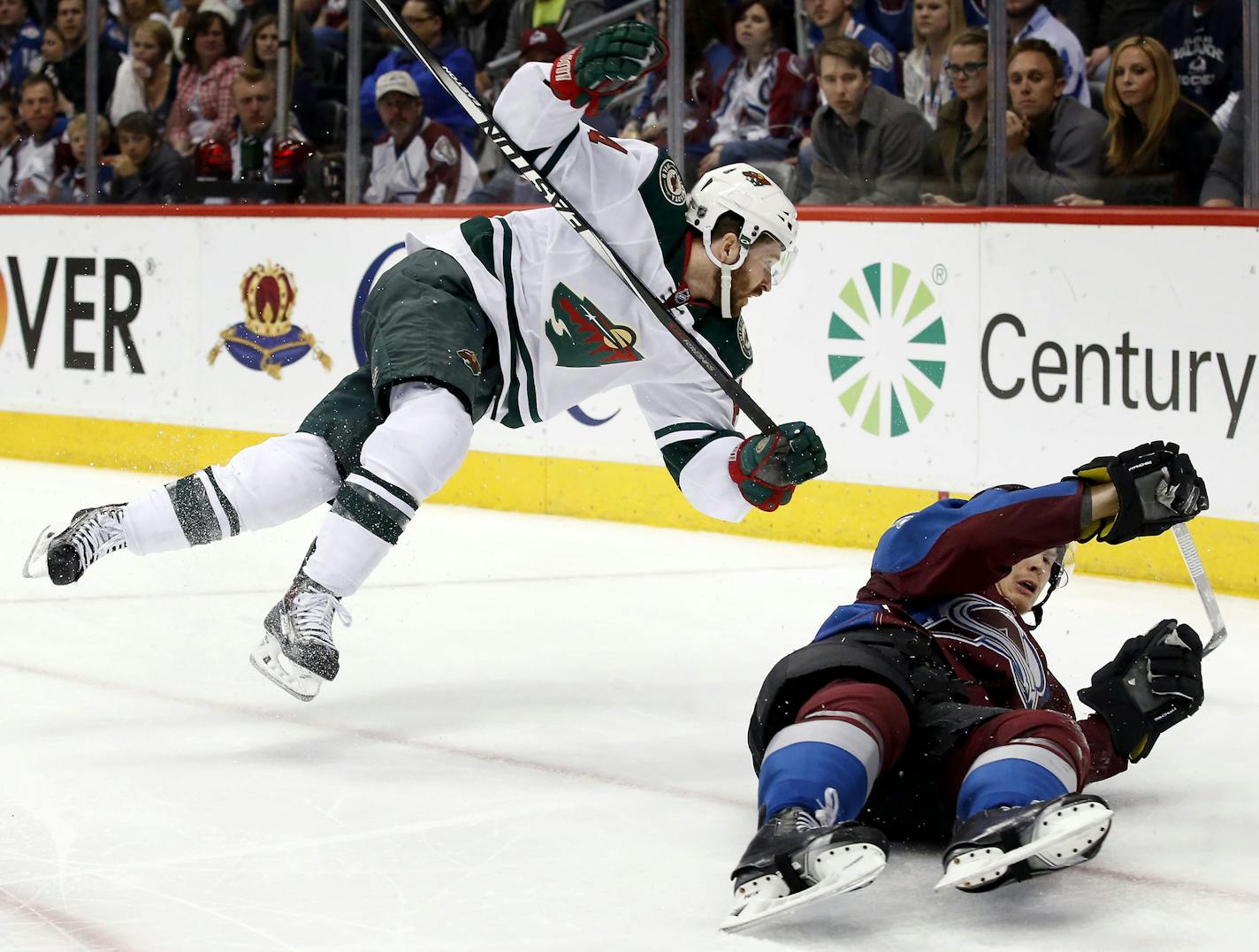 Justin Fontaine (14) and Nick Holden (2) collided in the third period. ] CARLOS GONZALEZ cgonzalez@startribune.com - April 26, 2014, Denver, Colorado, Pepsi Center, NHL, Minnesota Wild vs. Colorado Avalanche, Stanley Cup Playoffs round 1, Game 5