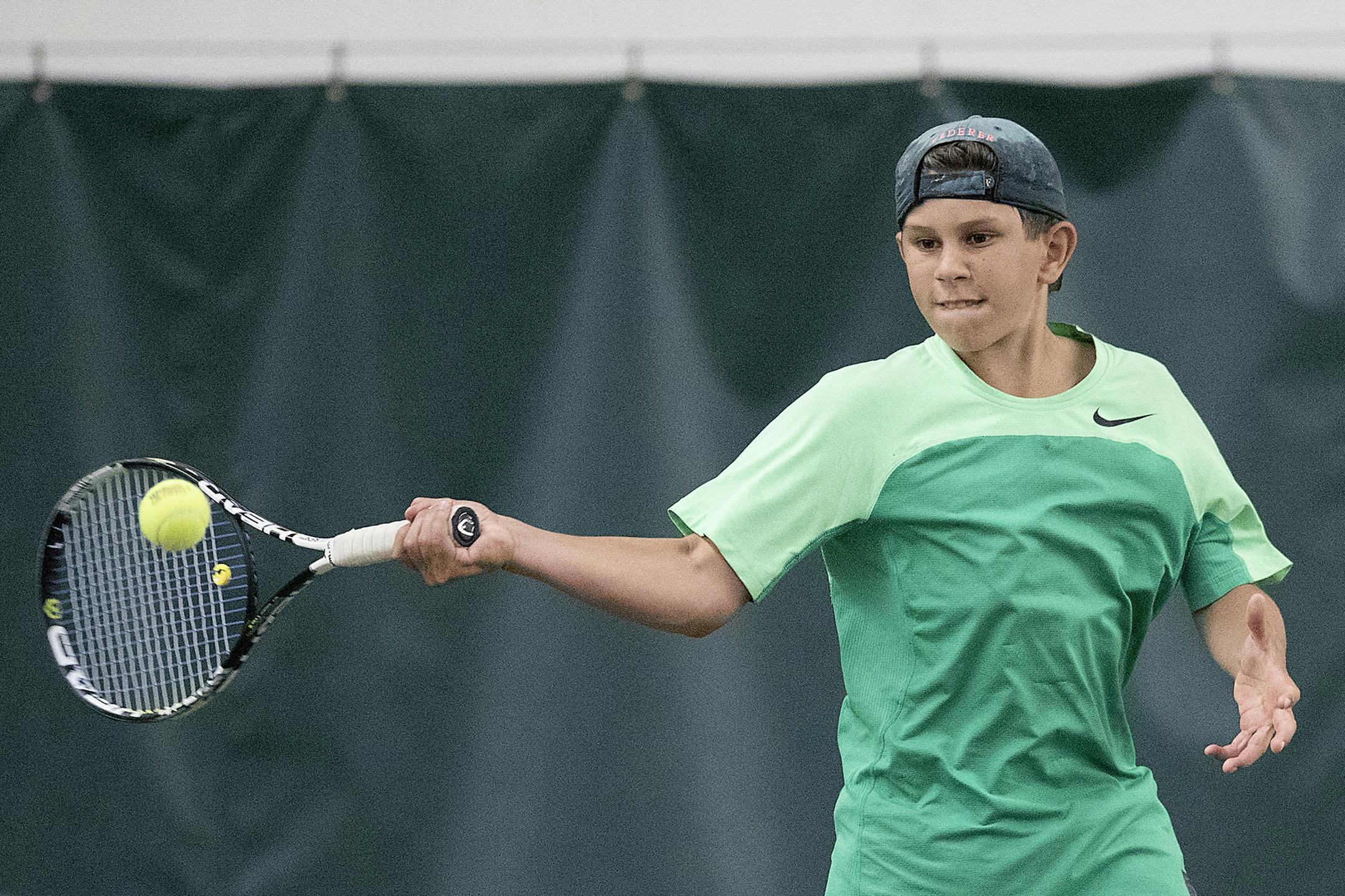 Mounds View seventh-grader Christo Alex defeated Edina's Luke Westholder, 7-5, 6-7, 4-6, in the decisive match to lift the Mustangs to a 4-3 victory Tuesday in the Class 2A boys' tennis team state tournament at the U of M Baseline Tennis Center. Photo: ELIZABETH FLORES ï liz.flores@startribune.com