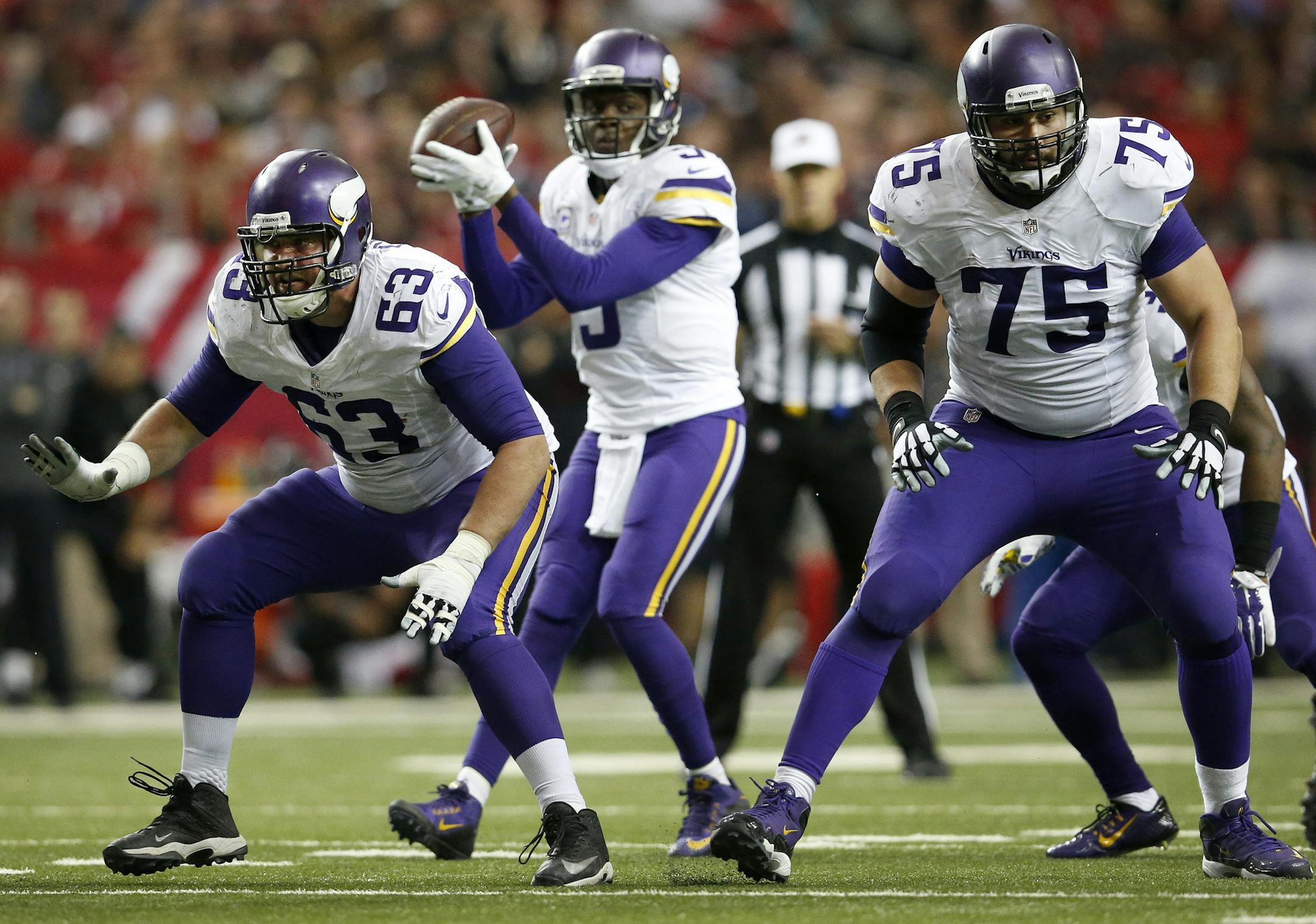 Minnesota Vikings offensive lineman Brandon Fusco (63) and Matt Kalil (75). ] CARLOS GONZALEZ ï cgonzalez@startribune.com - November 29, 2015, Atlanta, GA, Georgia Dome, NFL, Minnesota Vikings vs. Atlanta Falcons ORG XMIT: MIN1511301208261814 ORG XMIT: MIN1511301932231932