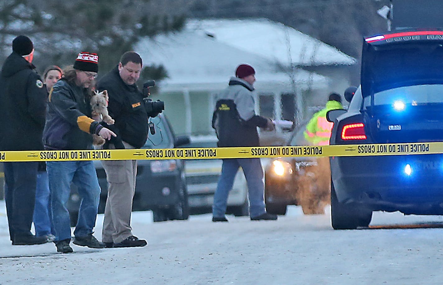 Authorities have blocked off an area on 92nd Avenue between 5th and 7th Street NE in Blaine after an officer responding to a home break-in in Thursday morning shot and wounded a suspect. Elizabeth Flores, Star Tribune. ORG XMIT: MIN1501220817185350