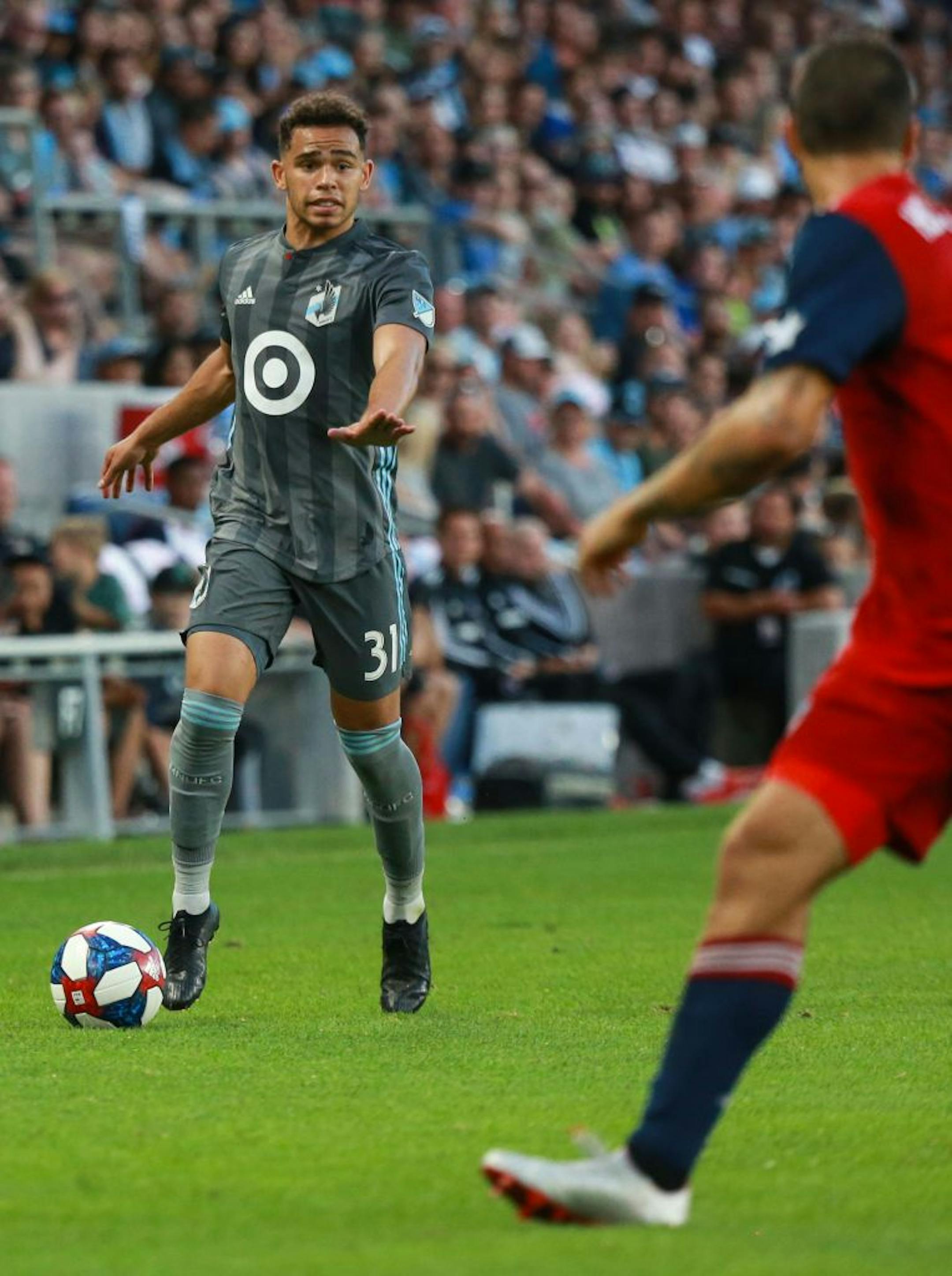 Minnesota FC midfielder Hassani Dotson (31) signals to his teammate to stay where he is. ALEX KORMANN ¥ alex.kormann@startribune.com The Minnesota United FC took on FC Dalls on Saturday July 13, 2019 at Allianz Field in St. Paul, MN.