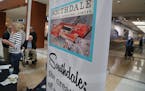 A reproduction of an early poster from Southdale Mall on display from the 1950s at the Southdale 60th anniversary party Saturday, Oct. 8, 2016, in Edi