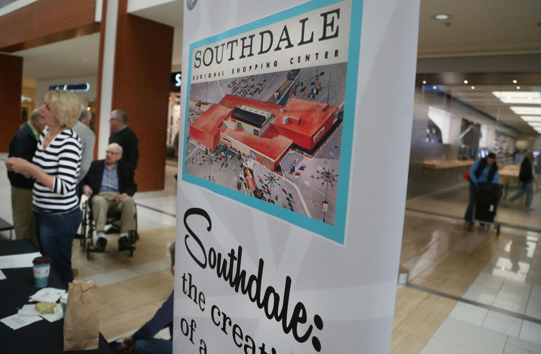 A reproduction of an early poster from Southdale Mall on display from the 1950s at the Southdale 60th anniversary party Saturday, Oct. 8, 2016, in Edina, MN.