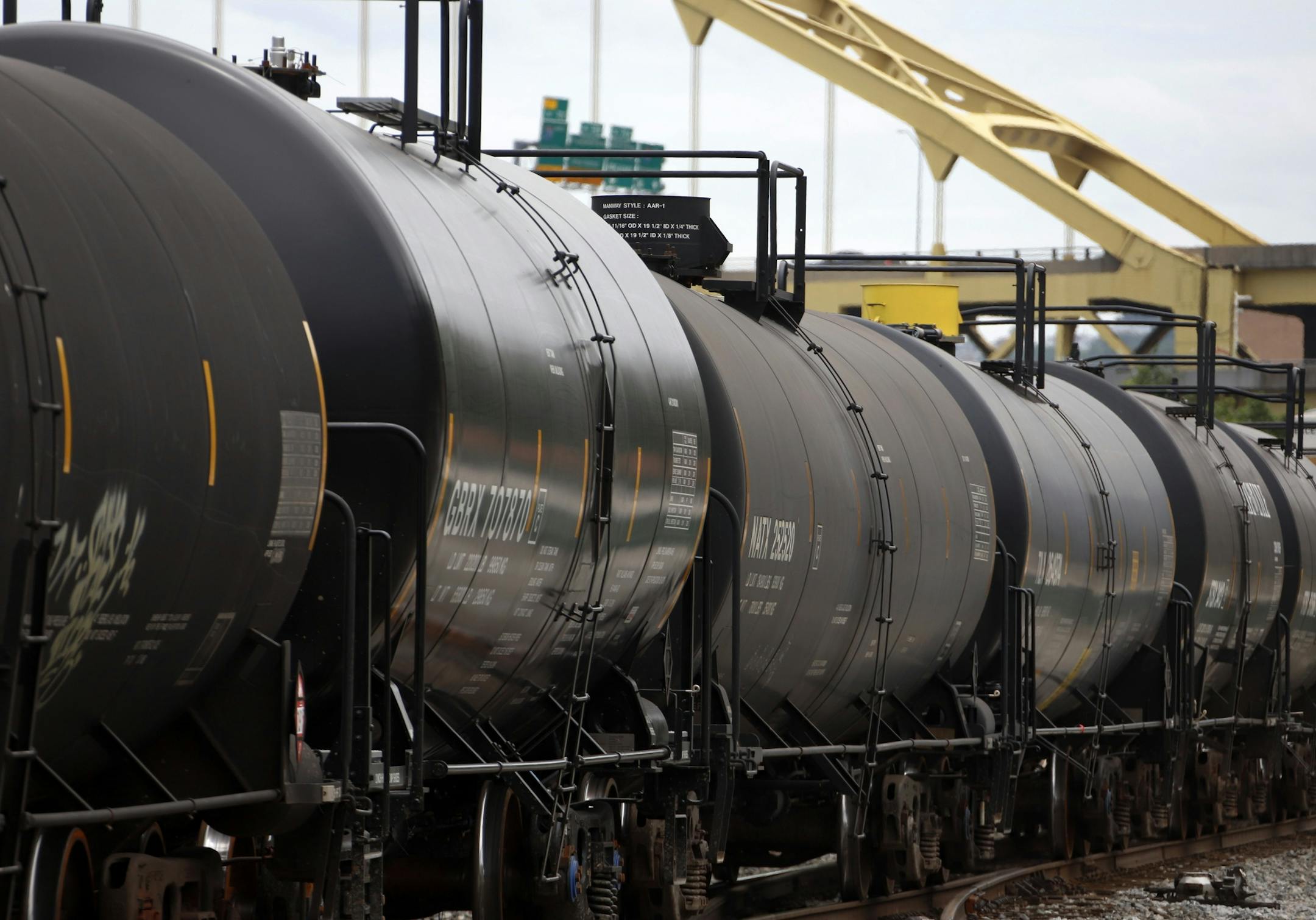 A CSX freight train pulls tank cars past downtown Pittsburgh on Monday, June 24, 2019. (AP Photo/Gene J. Puskar) ORG XMIT: MER005896a5843c6ac68669d78ed2b65