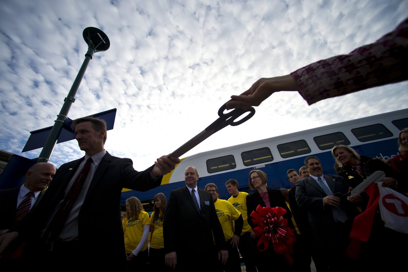 Big ceremonial scissors were distributed for the ribbon-cutting ceremony for the Ramsey station of the Northstar Commuter rail line, Thursday, November 8, 2012.