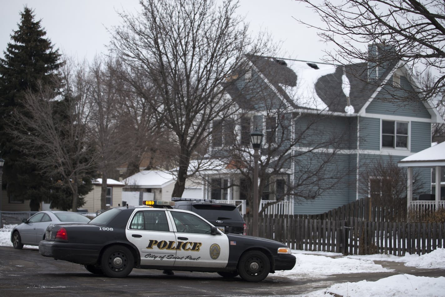 St. Paul Police are at the intersection of Park Street and Lyton Place after reports of a man barricaded in a home nearby, Friday, Jan. 2, 2015..