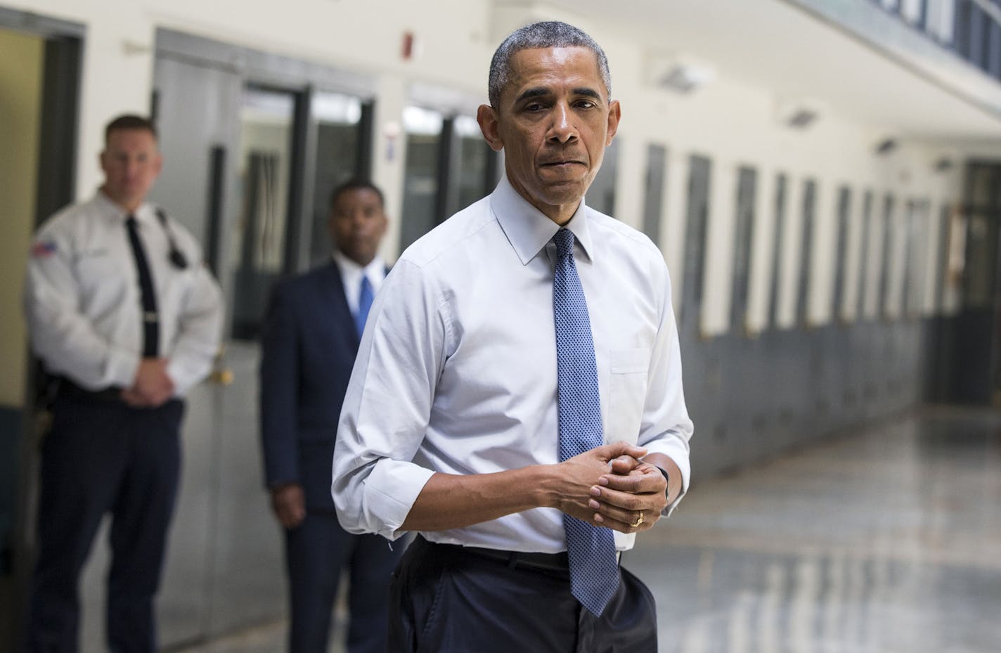 President Barack Obama pauses as he speaks at the El Reno Federal Correctional Institution in El Reno, Okla., Thursday, July 16, 2015. As part of a weeklong focus on inequities in the criminal justice system, the president will meet separately Thursday with law enforcement officials and nonviolent drug offenders who are paying their debt to society at the El Reno Federal Correctional Institution, a medium-security prison for male offenders near Oklahoma City. (AP Photo/Evan Vucci) ORG XMIT: MIN2