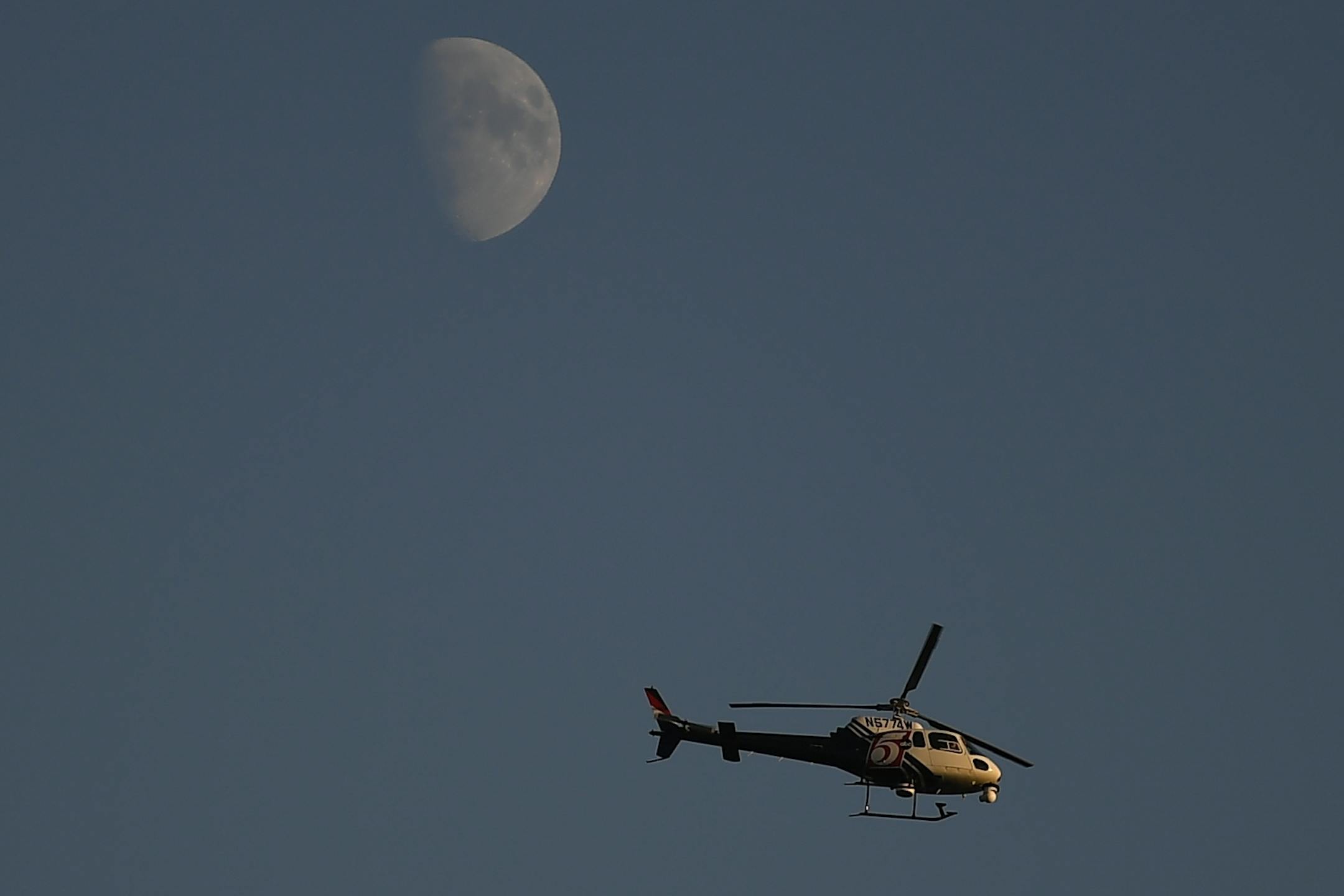 A news helicopter flew over the town of Barron, Wisc., Thursday evening as law enforcement and volunteer groups wrapped up their roadside search for evidence related to the disappearance of 13-year old Jayme Closs and the murder of her parents over the weekend.