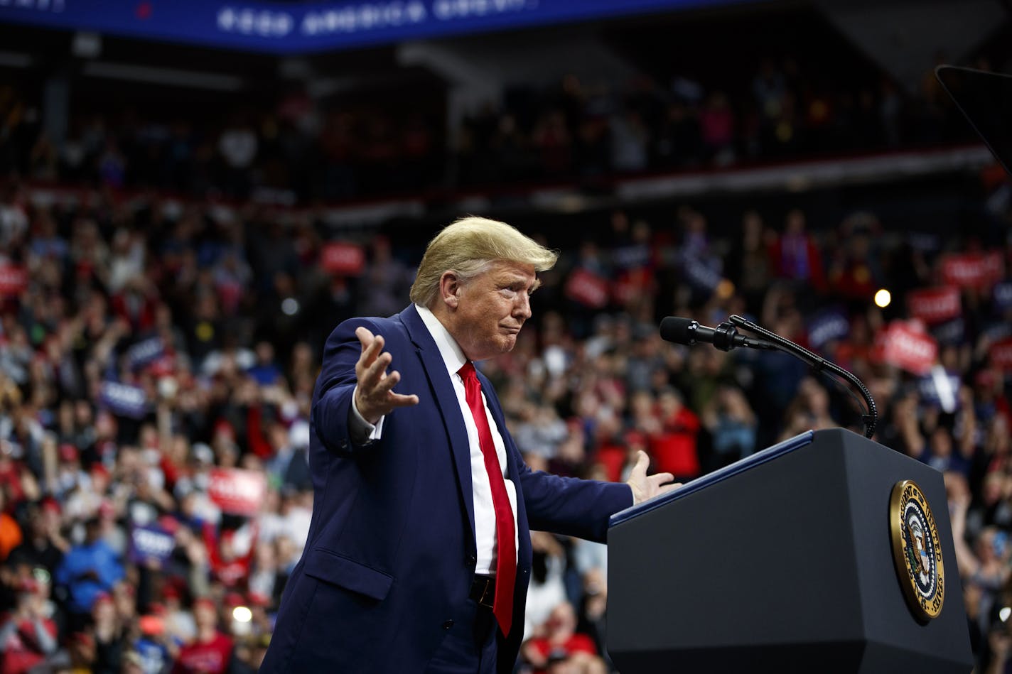 President Donald Trump arrives to speak at a campaign rally at the Target Center, Thursday, Oct. 10, 2019, in Minneapolis. (AP Photo/Evan Vucci)