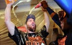 The Mets' Daniel Murphy celebrated in the locker room after a 3-2 series-clinching win against the Los Angeles Dodgers in Game 5 of the NLDS on Thursd