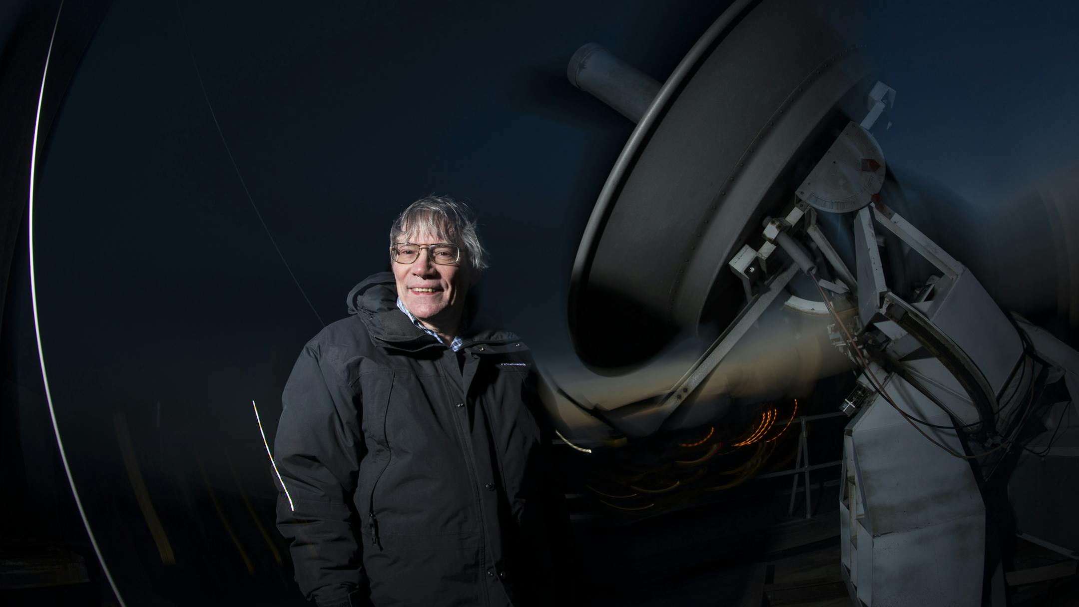 Alan Guth, one of the first to hypothesize the existence of inflationary forces that explain how the universe expanded so rapidly and so uniformly after the Big Bang, on a rooftop at the Massachusetts Institute of Technology in Cambridge, March 14, 2014. New evidence from radio astronomers has helped corroborate Guth's 35-year-old theories, long considered unsubstantiated but vital to astrophysicists. (Rick Friedman/The New York Times)