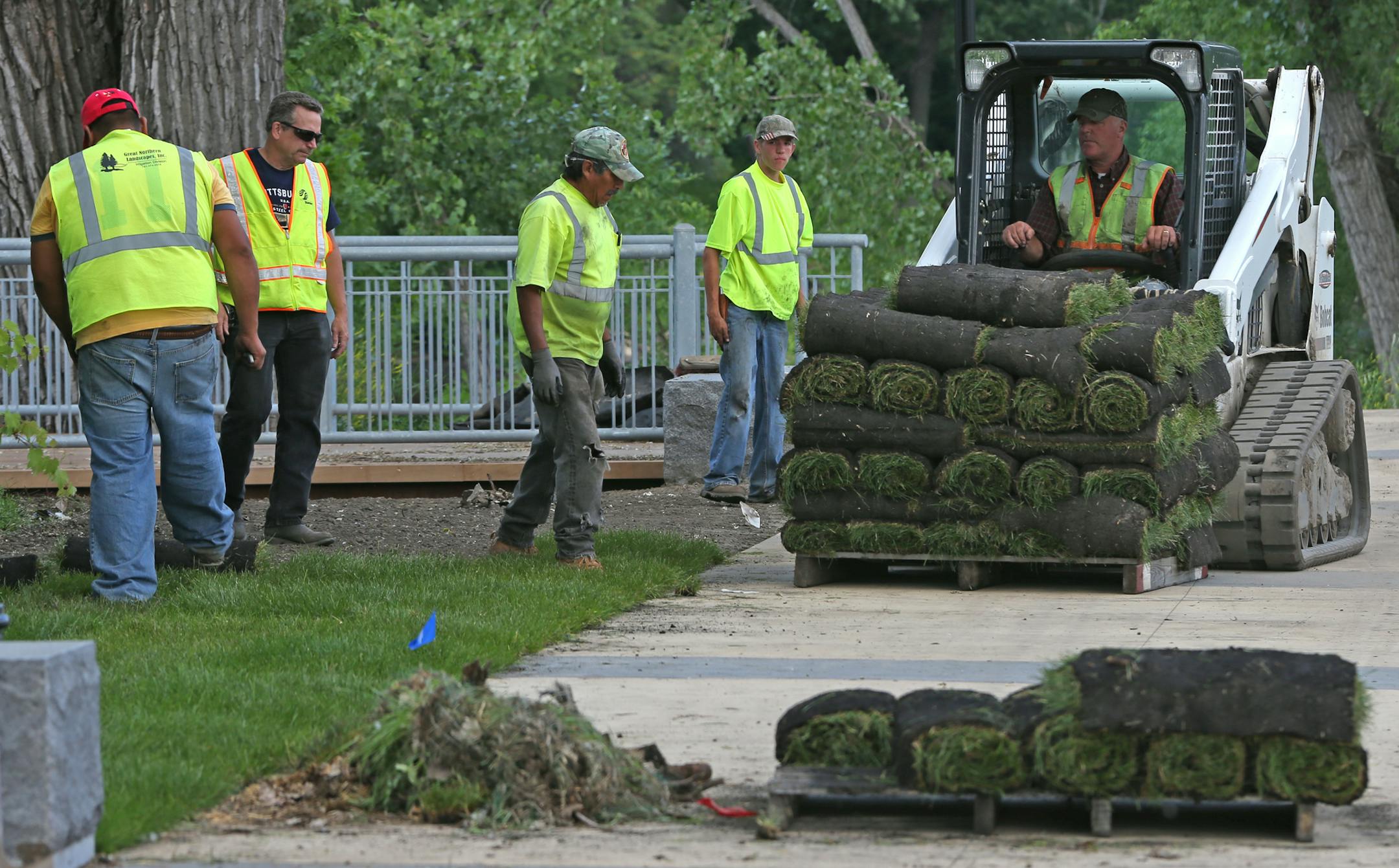 Landscaping crews put the finishing touches on the last, short link of the Rum River Regional Trail this week, winding up the year-long project in time for Riverfest Saturday in downtown Anoka. The decorative quarter-mile segment will run behind City Hall along the Rum to the existing paved bike trail three blocks north, said Greg Lee, city public services director. The $1.4 million project, nearly half covered by a federal transportation grant, will include two river overlooks, rain gardens wit