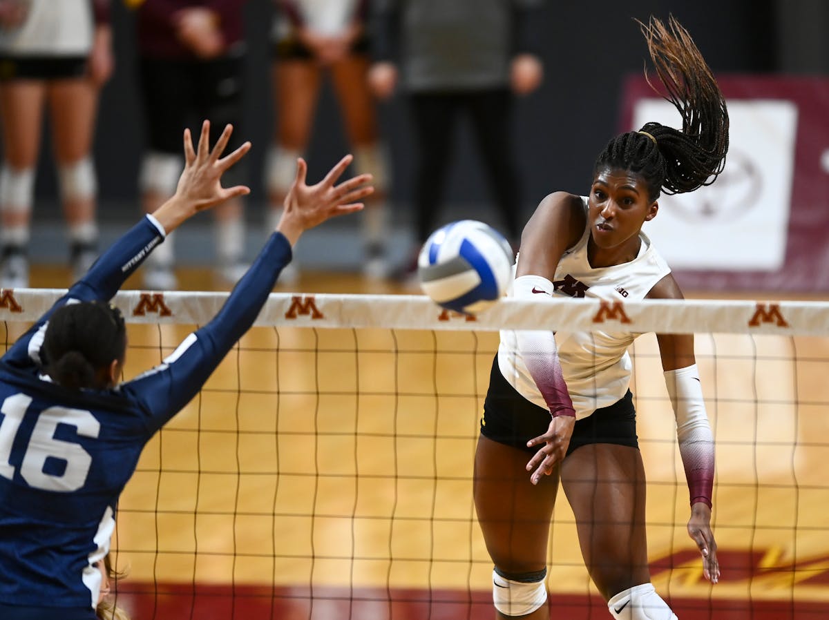 Minnesota opposite Stephanie Samedy (10) scored a point off a kill in the first set against Penn State.