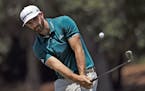Dustin Johnson chipped onto the seventh green during a practice round for The Players Championship on Wednesday. Johnson has not finished better than 