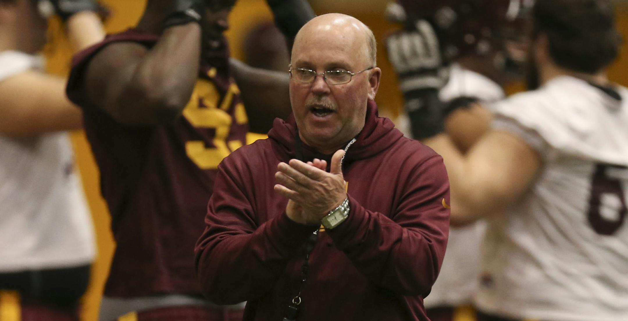Head football coach Jerry Kill got his players fired up at practice last month.