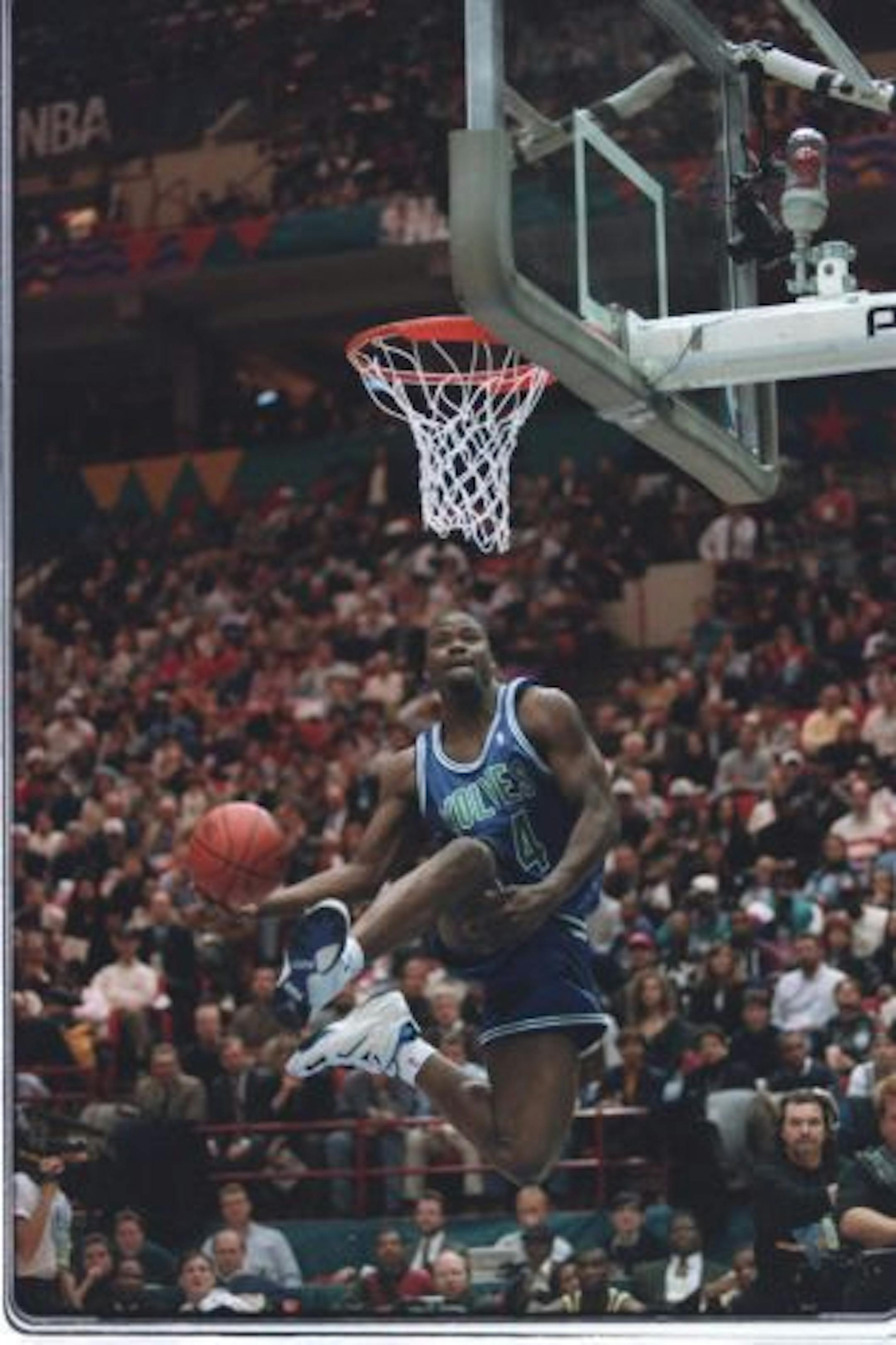 J.R. Rider performs during the slam dunk contest prior to the NBA All Star game in 1994.