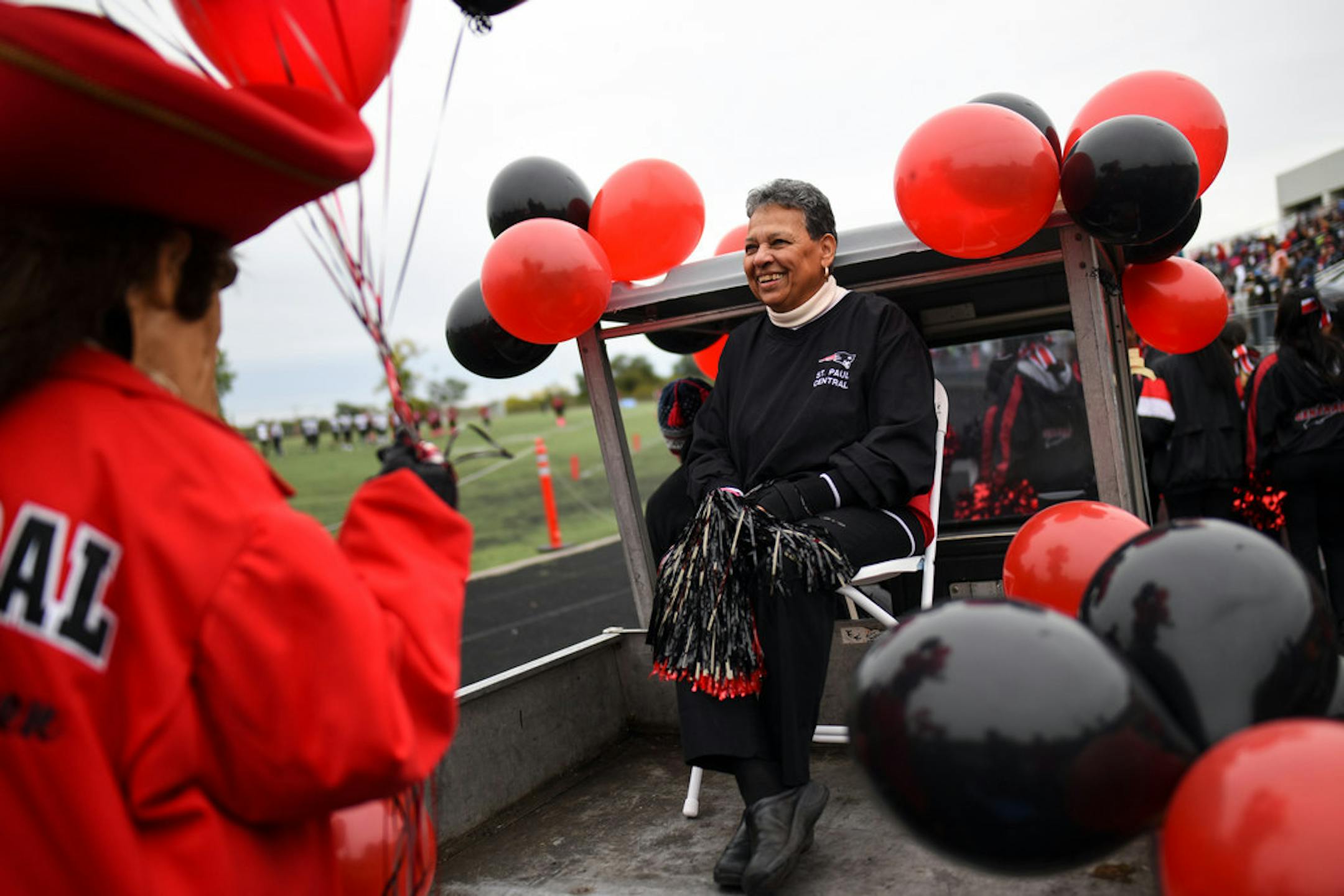 Longtime Central High School Principal Mary Mackbee was all smiles as she was driven off to a halftime ceremony in her honor last fall. Photo by AARON LAVINSKY