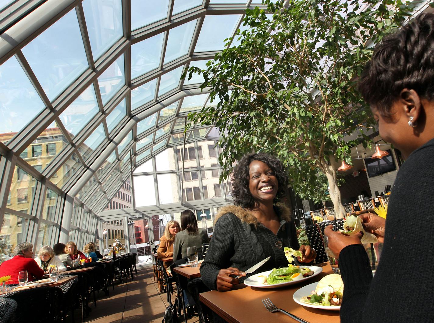 Frances Essien enjoys a business lunch with colleagueGina Menyah under the dorm in the rooftop restaurant at the Union restaurant and bar. Shinders redone. The Rick Nelson Review of the Union Bar, downtown Minneapolis. The chef, Jim Christiansen ] TOM WALLACE &#x2022; twallace@startribune.com _ Assignments #20027981A_ March 7, 2013_ SLUG: 253874 rn031413_ EXTRA INFORMATION: Union in downtown Minneapolis. 731 Hennepin Av 612 455 6690 chef Jim Christiansen